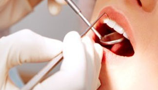 Gum Disease: Common Symptoms and How It Is Treated